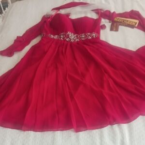 Elegant cocktail formal dress in brilliant red
